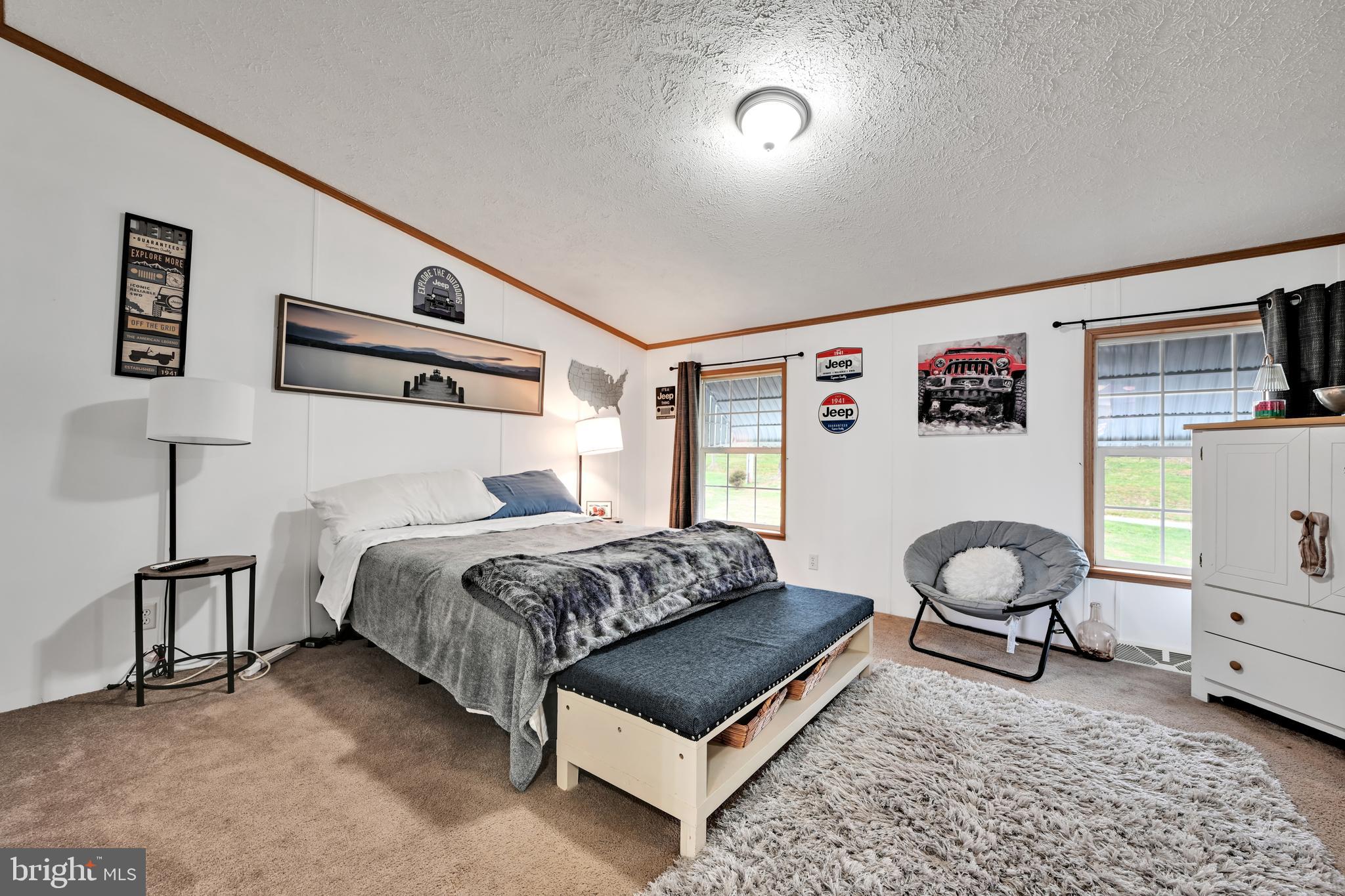 60 Bordnersville Road Jonestown, PA 17038 - Photo 32 of 45 a bedroom with a bed and wooden floor