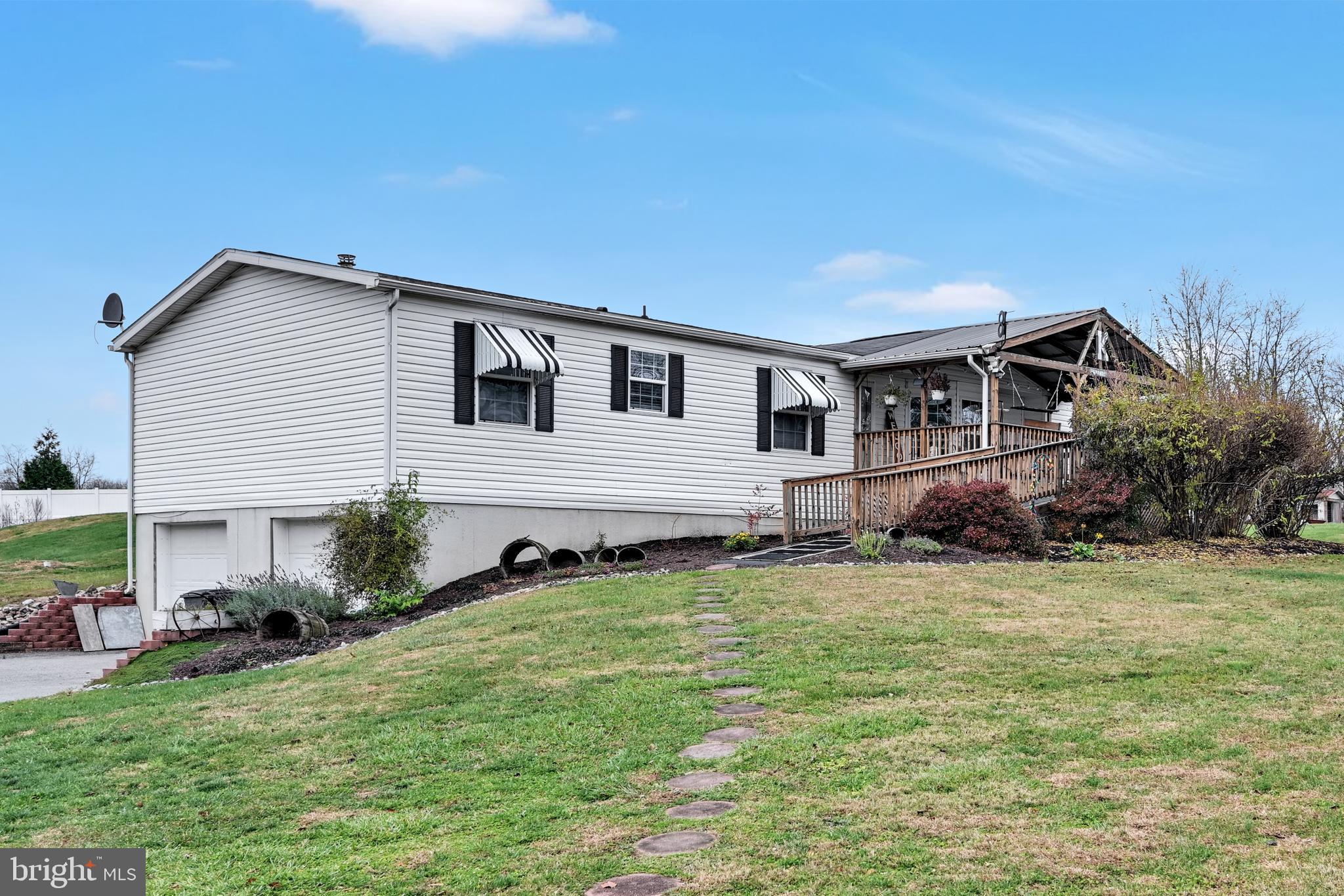 60 Bordnersville Road Jonestown, PA 17038 - Photo 4 of 45 a front view of a house with a yard