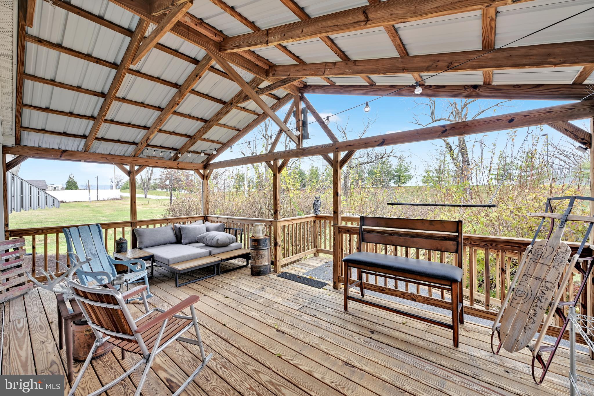 60 Bordnersville Road Jonestown, PA 17038 - Photo 7 of 45 a view of a chairs and tables in the balcony