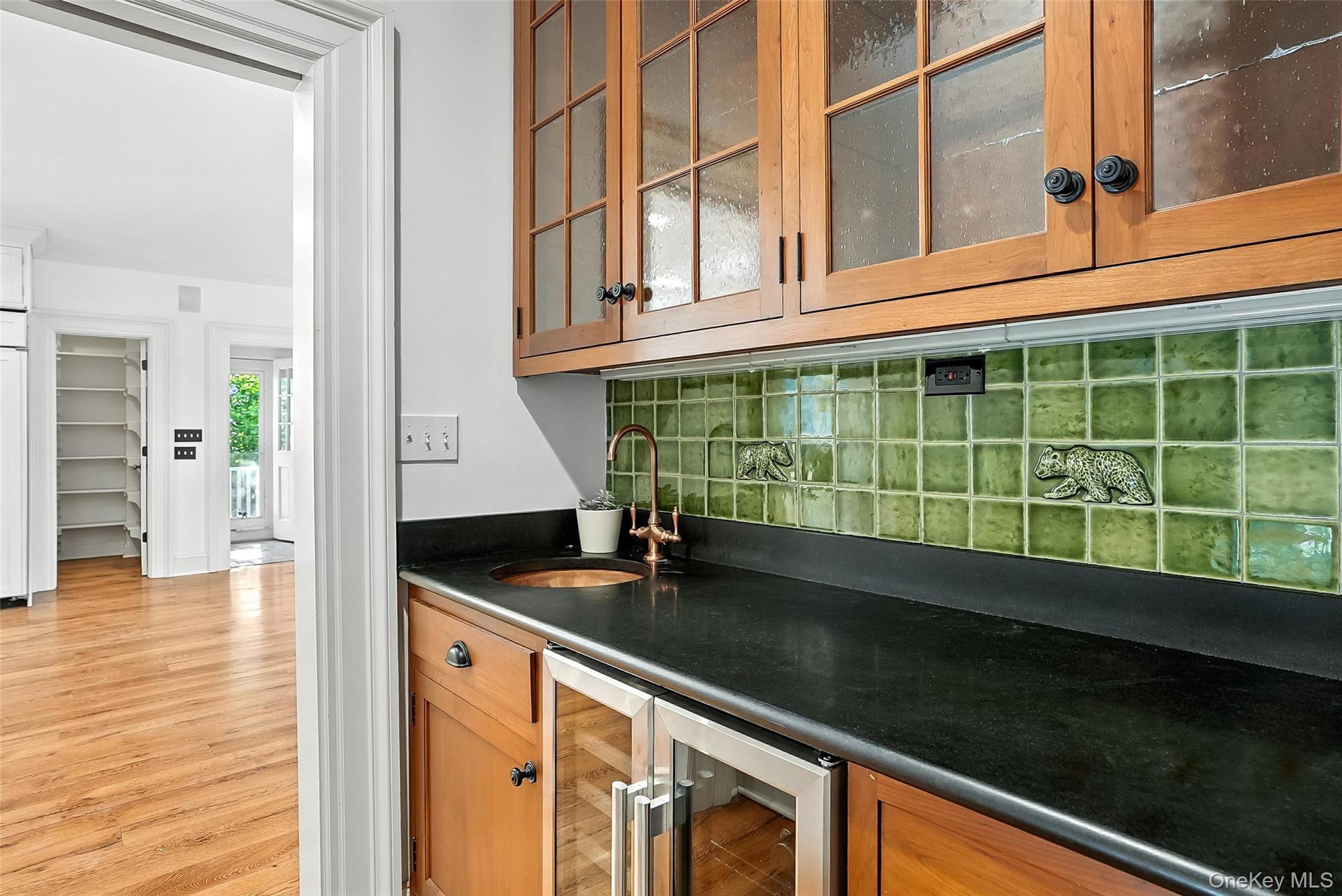14 Mendota Avenue Rye, NY 10580 - Photo 12 of 33 a kitchen with granite countertop a sink and a window