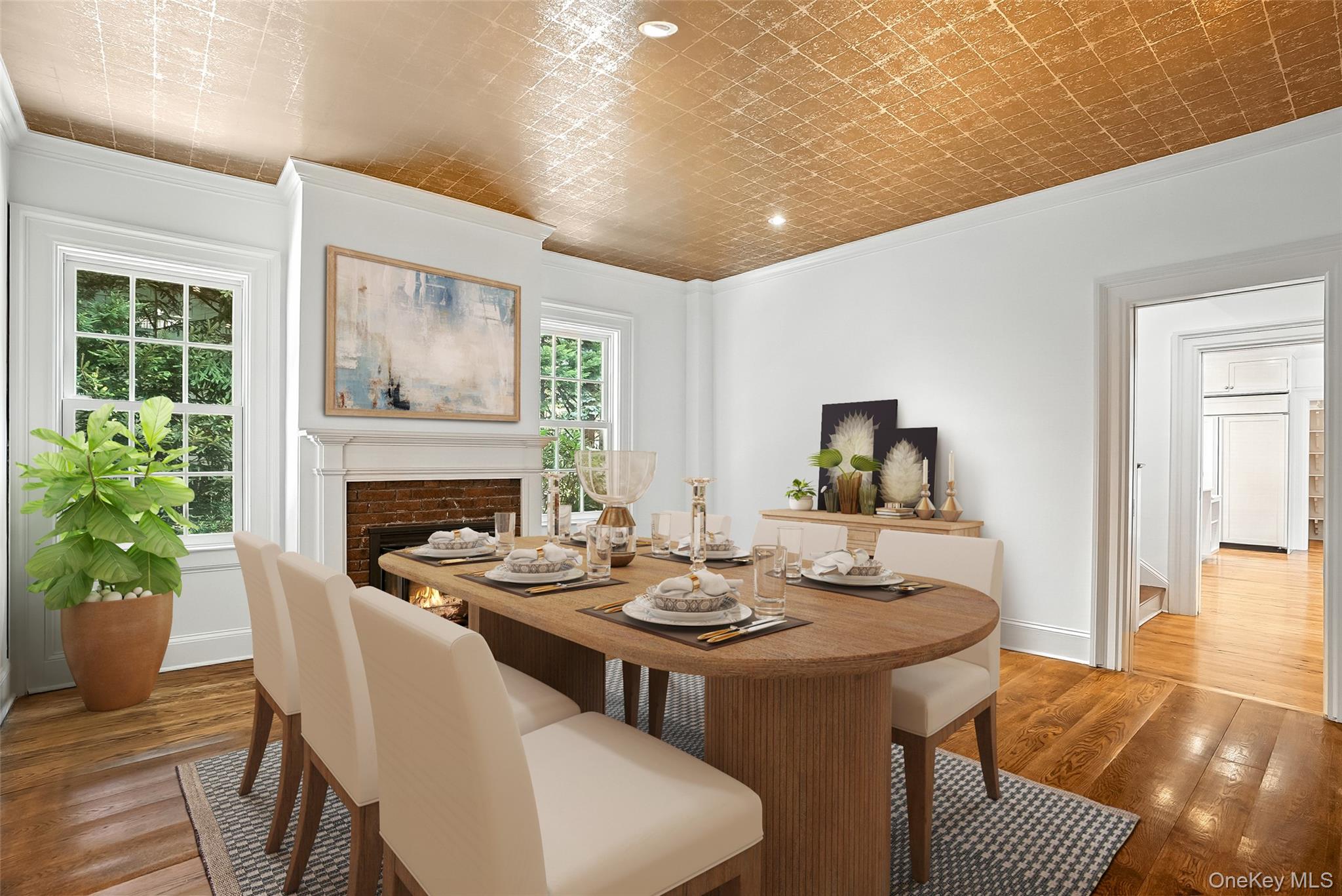 14 Mendota Avenue Rye, NY 10580 - Photo 13 of 33 a dining room with furniture a fireplace and wooden floor