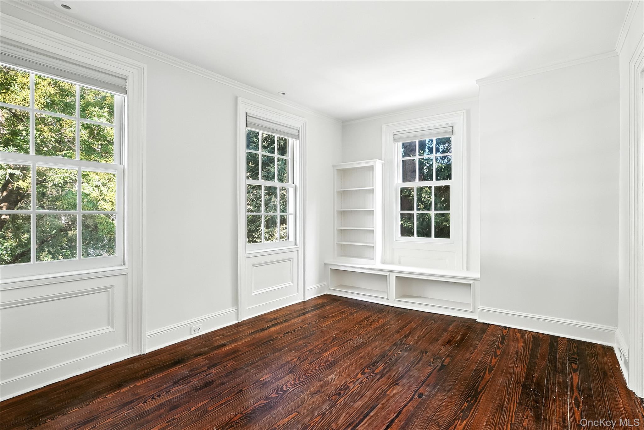 14 Mendota Avenue Rye, NY 10580 - Photo 19 of 33 a view of an empty room with wooden floor and a window