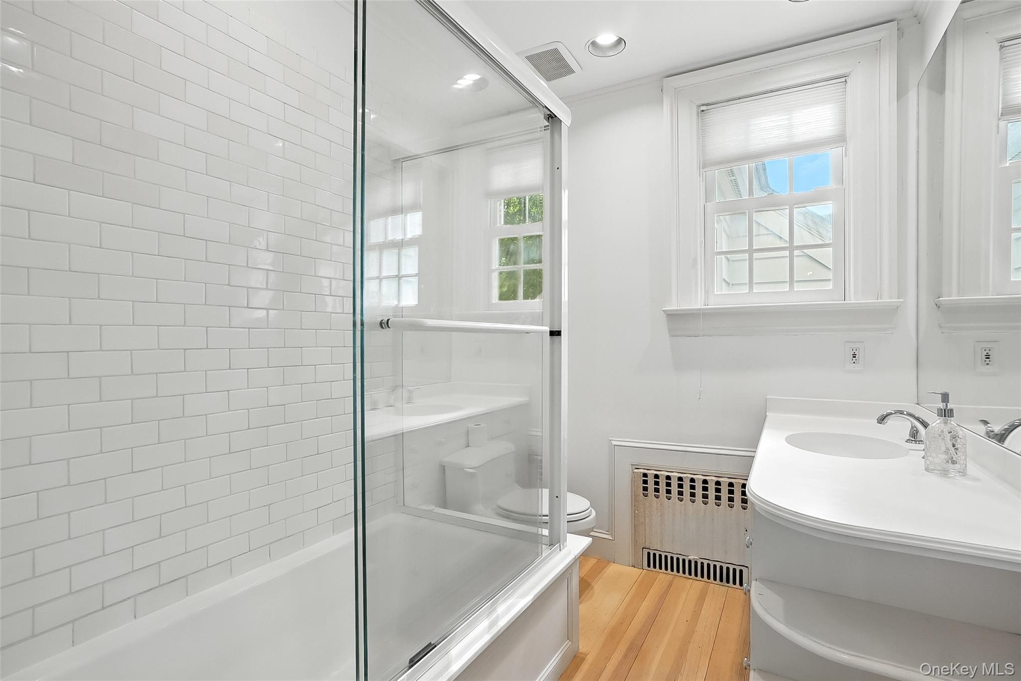 14 Mendota Avenue Rye, NY 10580 - Photo 20 of 33 a bathroom with a bathtub and a shower