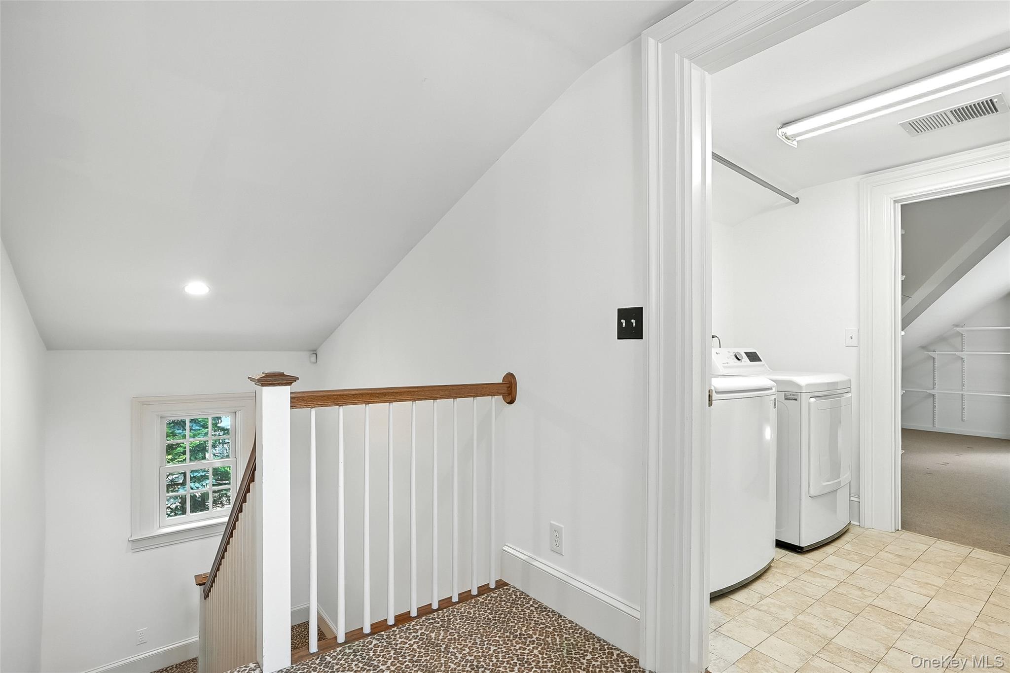 14 Mendota Avenue Rye, NY 10580 - Photo 21 of 33 a view of a hallway with bathroom and wooden floor