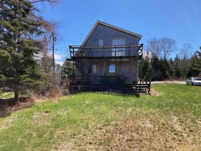 403 Mooseneck Road Addison, ME 04606 - Photo 3 of 20 Exterior garage/apt from water