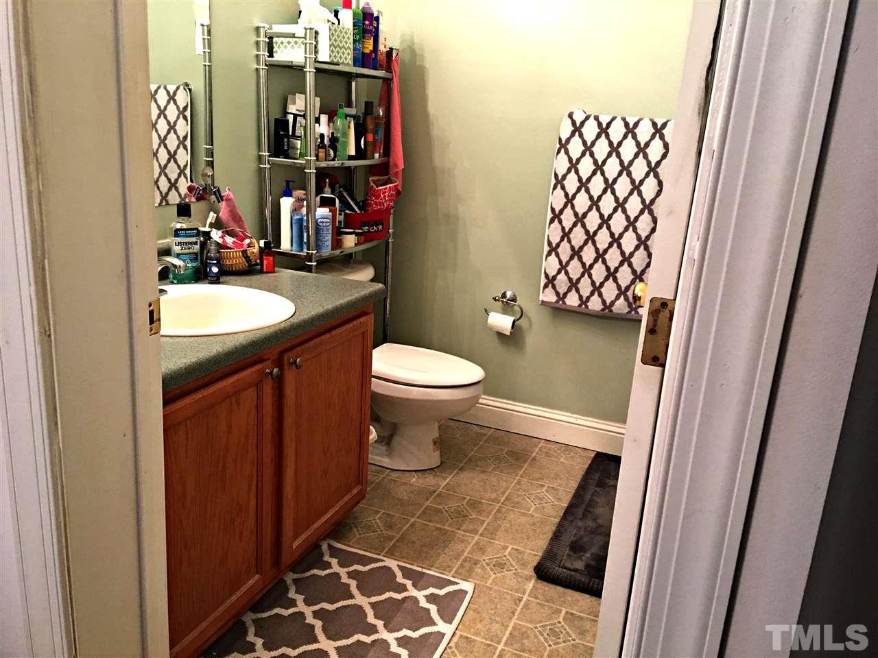 375 Ole Cabin Road Roxboro, NC 27574 - Photo 10 of 11 a bathroom with a sink and a toilet