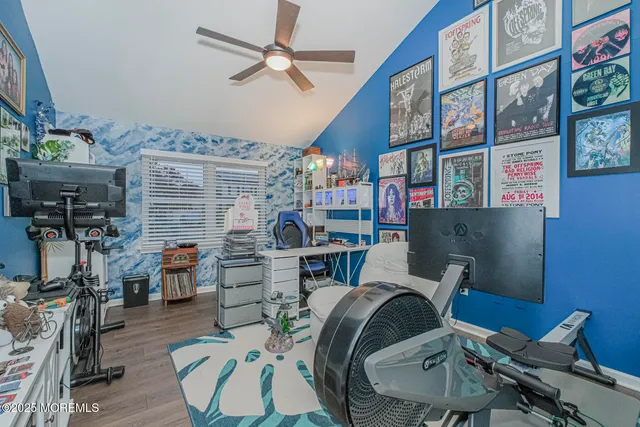 a room with furniture and wooden floor