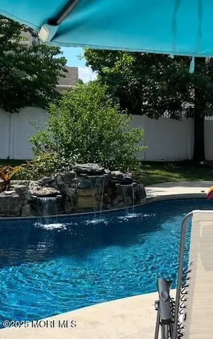 a view of a lake with a house