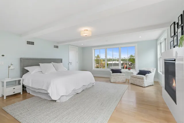 a bed room with a bed and a couch