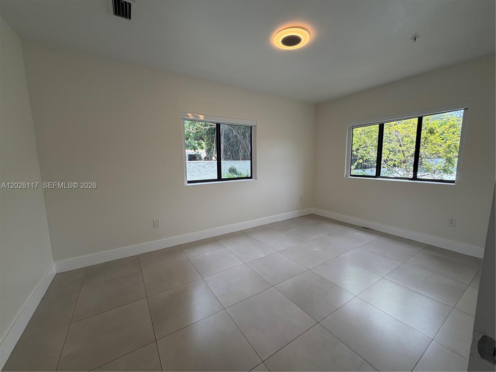 2425 Northwest 24th Avenue, Unit 103 Miami, FL 33142 - Photo 4 of 12