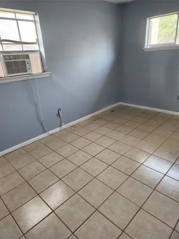 a view of a room and window