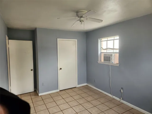 a view of an empty room with window