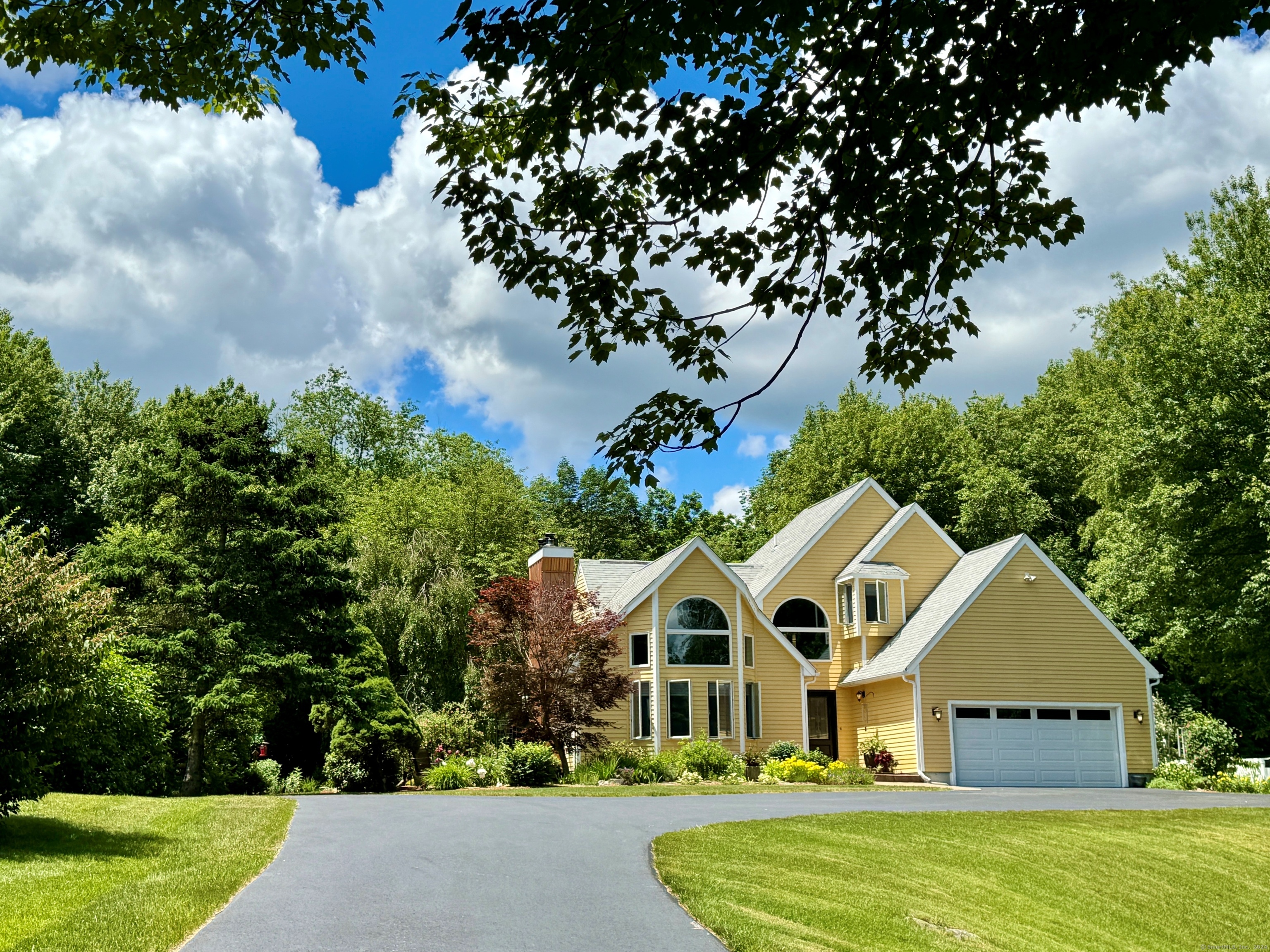 6 Columbia Landing Columbia, CT 06237 - Photo 1 of 1 a front view of a house with garden