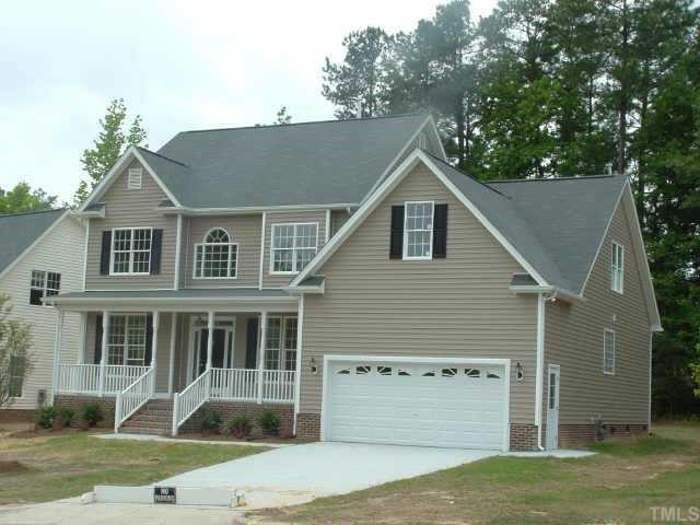 First floor master with open loft on 2nd floor. Front porch. Exterior Front