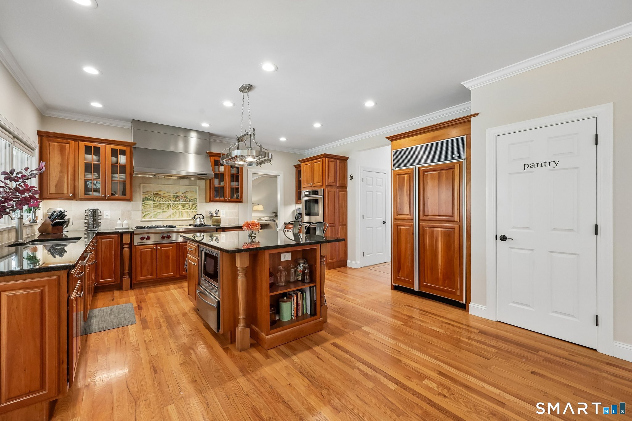 3 East Lake Road Danbury, CT 06811 - Photo 13 of 37 The kitchen is outfitted with a premium Sub-Zero refrigerator and top-of-the-line Wolf appliances, delivering exceptional performance and a sleek, professional-grade finish.