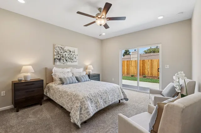 a bedroom with a bed and window