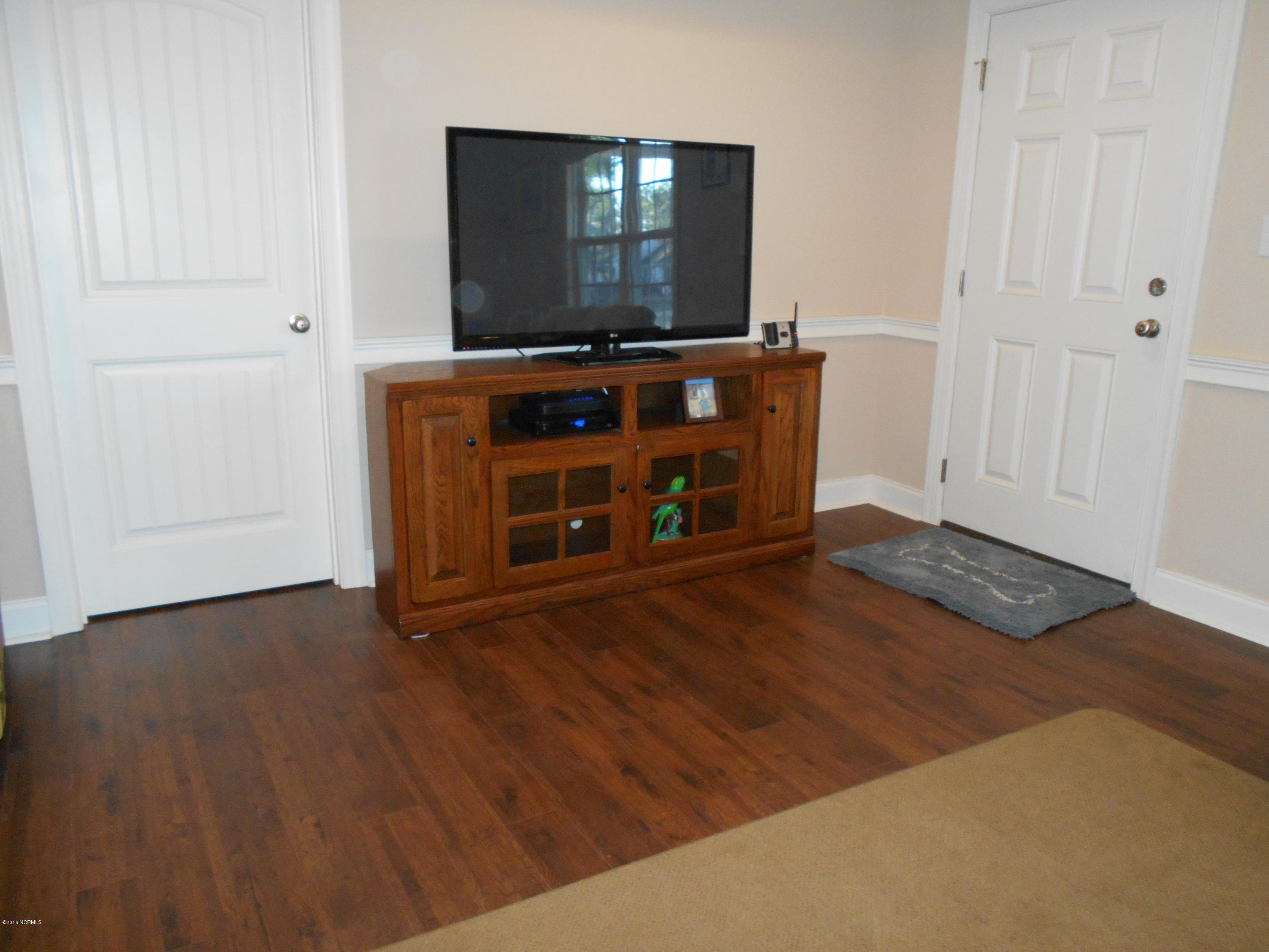 2001 Pinehurst Road Southport, NC 28461 - Photo 9 of 19 gleaming hardwoods in all rooms except baths and laundry