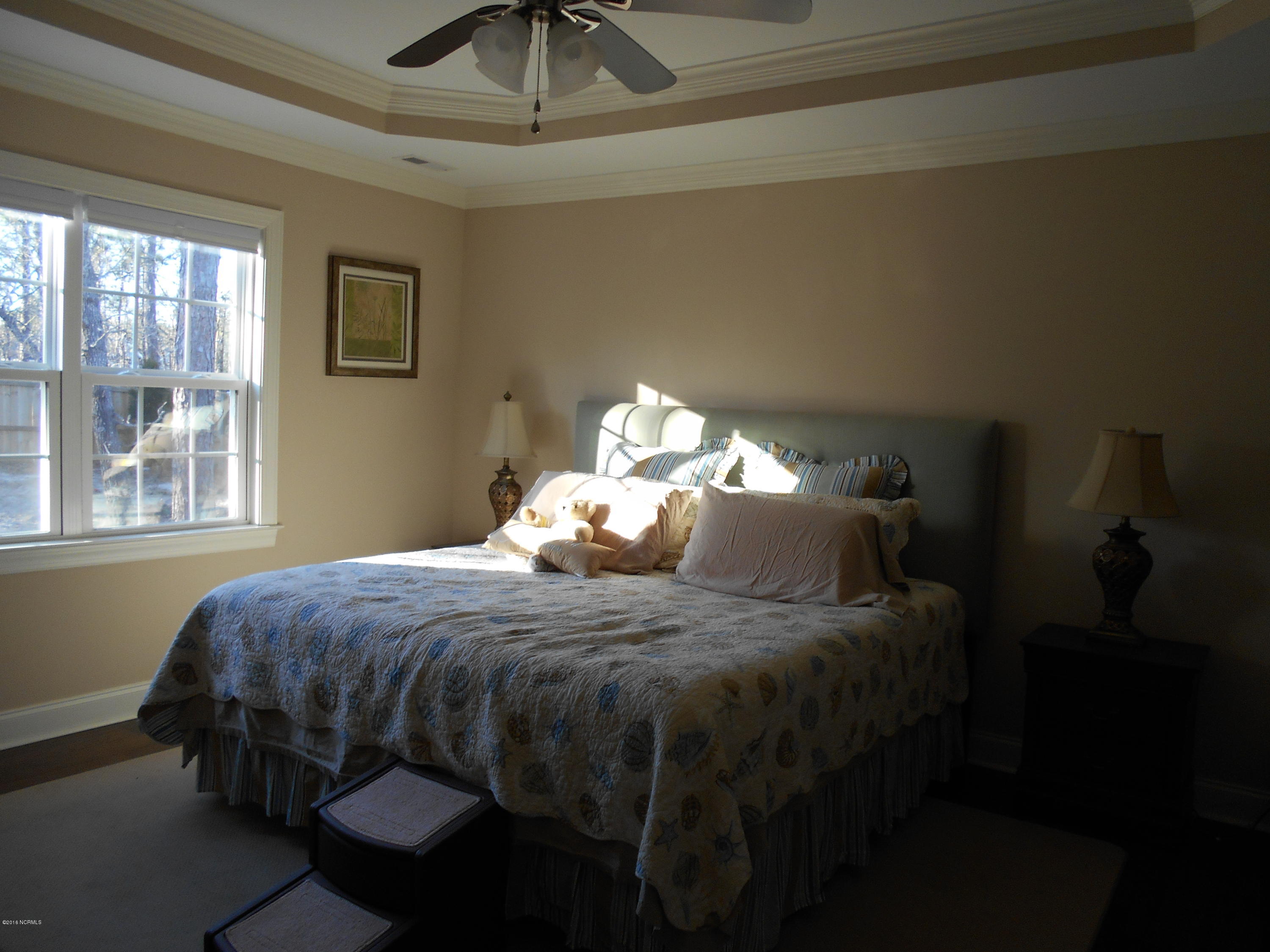 2001 Pinehurst Road Southport, NC 28461 - Photo 10 of 19 main bedroom tray ceiling