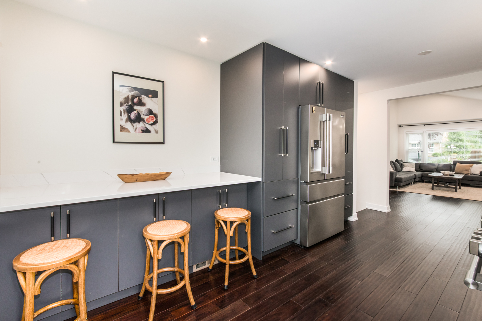 900 Rowe Avenue Park Ridge, IL 60068 - Photo 6 of 32 a kitchen with stainless steel appliances granite countertop a refrigerator and a dining table