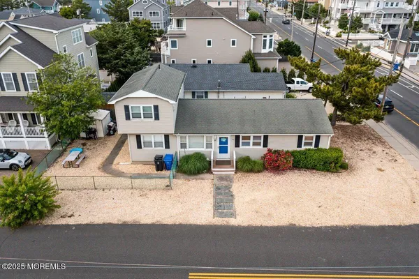 an aerial view of a house with a garden