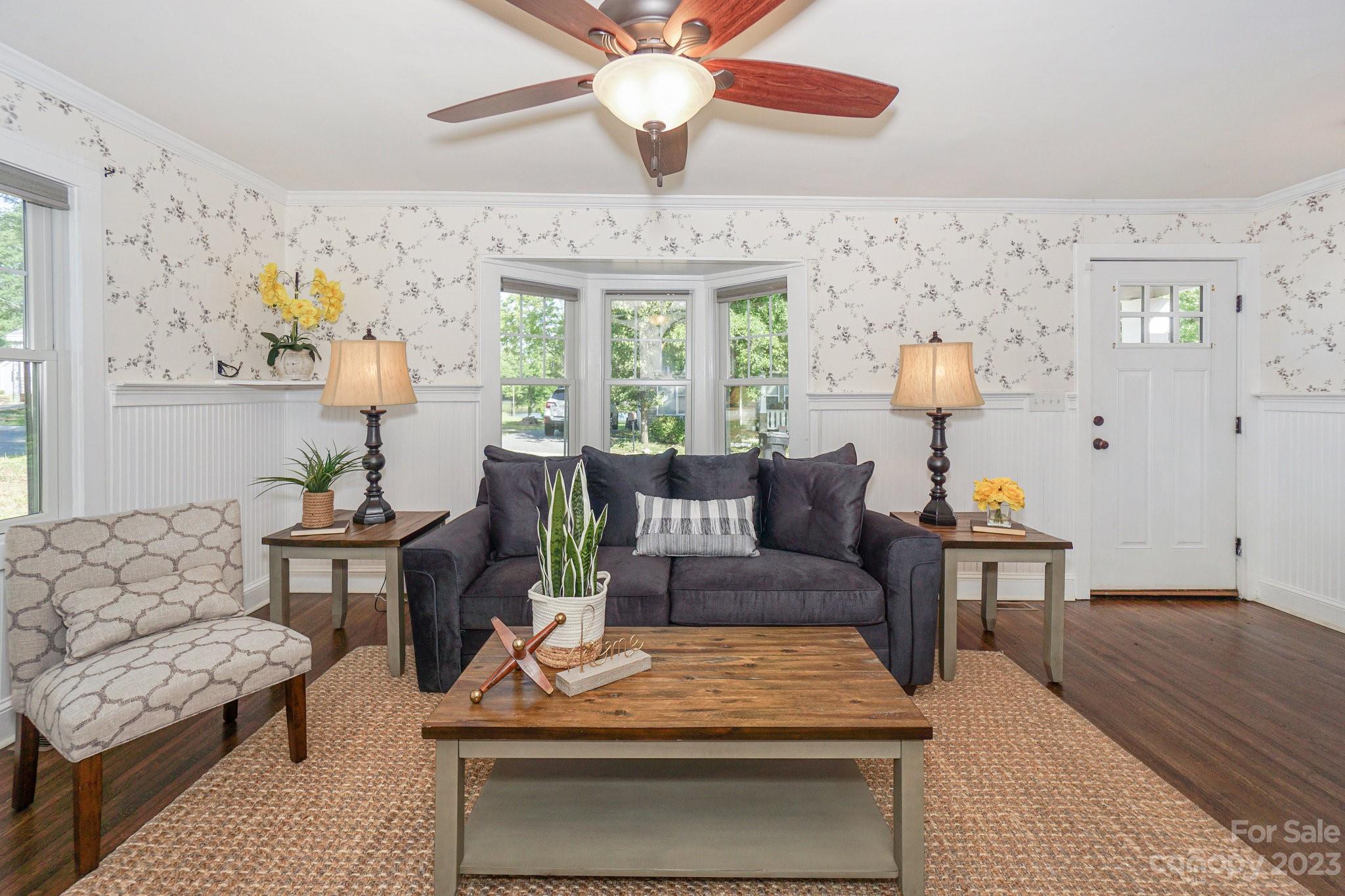 303 Houston Street Davidson, NC 28036 - Photo 6 of 29 a living room with furniture and a large window