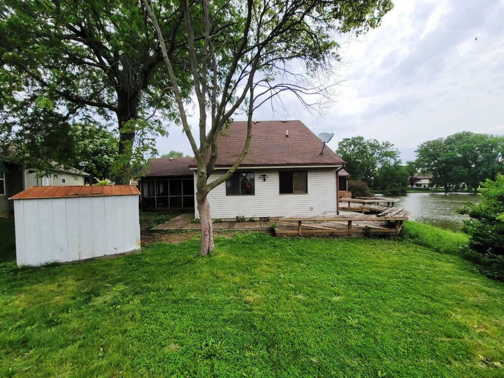 2601 Rachel Road Champaign, IL 61822 - Photo 21 of 22 a front view of a house with a yard and trees