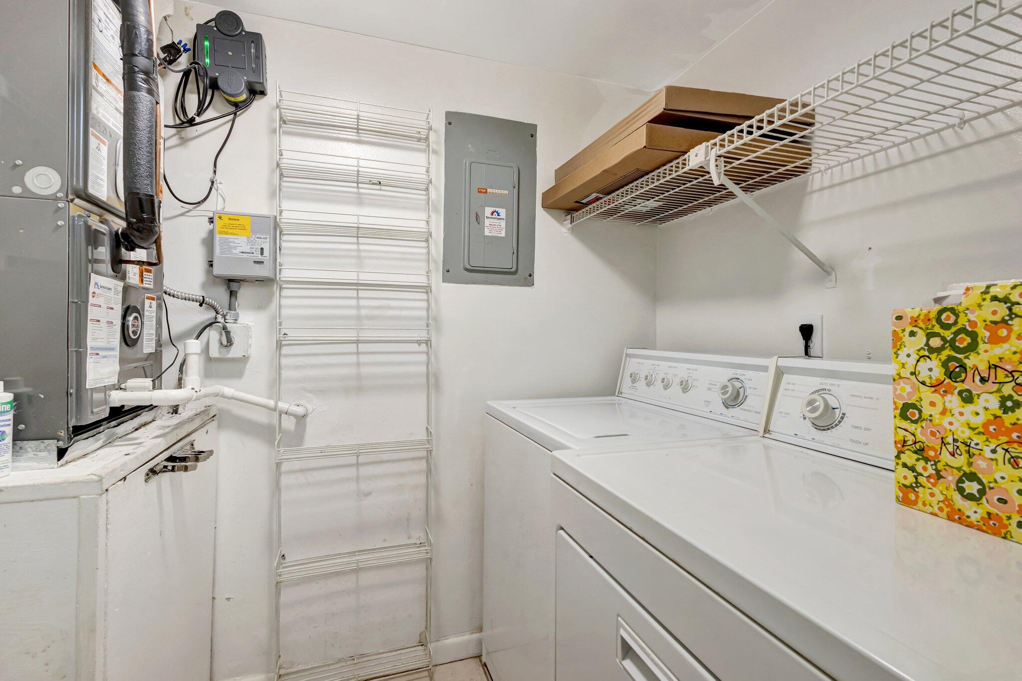 335 Knotty Pine Circle, Unit A1 Greenacres, FL 33463 - Photo 11 of 31 Utility and Laundry Room