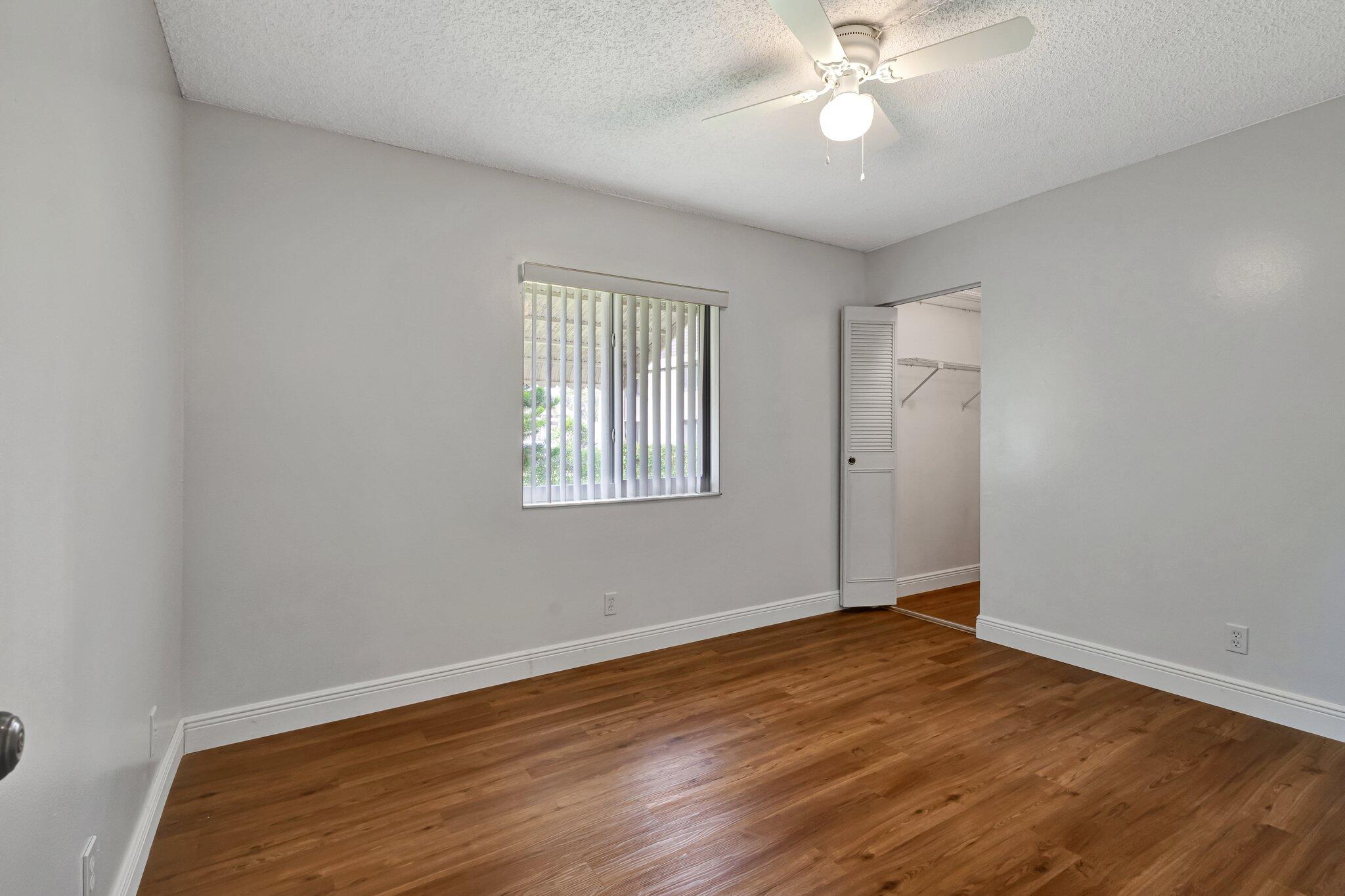 335 Knotty Pine Circle, Unit A1 Greenacres, FL 33463 - Photo 17 of 31 Second Bedroom