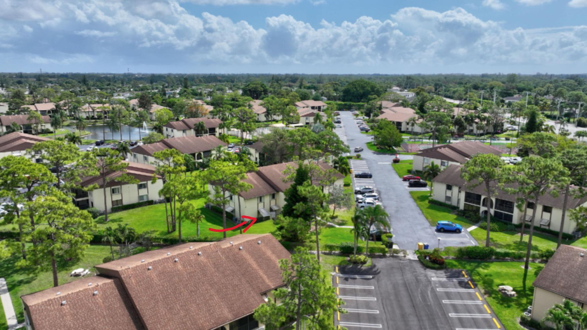 335 Knotty Pine Circle, Unit A1 Greenacres, FL 33463 - Photo 26 of 31 Aerial View of the Building