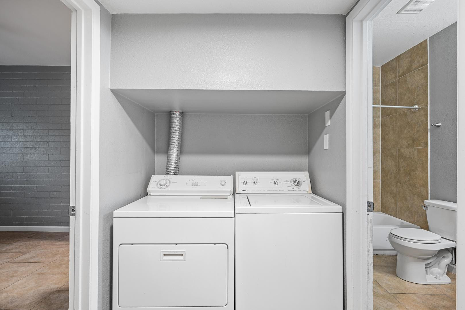 1518 West Colter Street, Unit 31 Phoenix, AZ 85015 - Photo 11 of 11 a utility room with dryer and washer