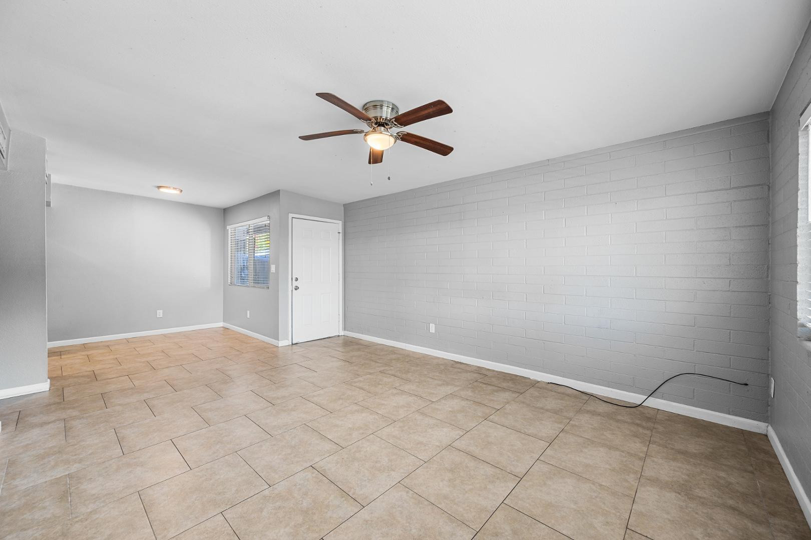 1518 West Colter Street, Unit 31 Phoenix, AZ 85015 - Photo 3 of 11 a view of an empty room