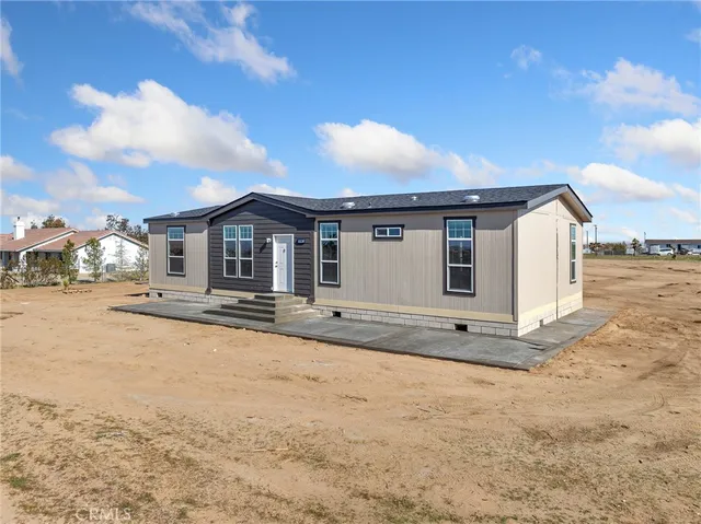 a view of a house with a patio