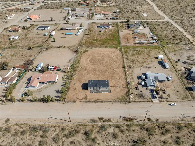 an aerial view of beach and city