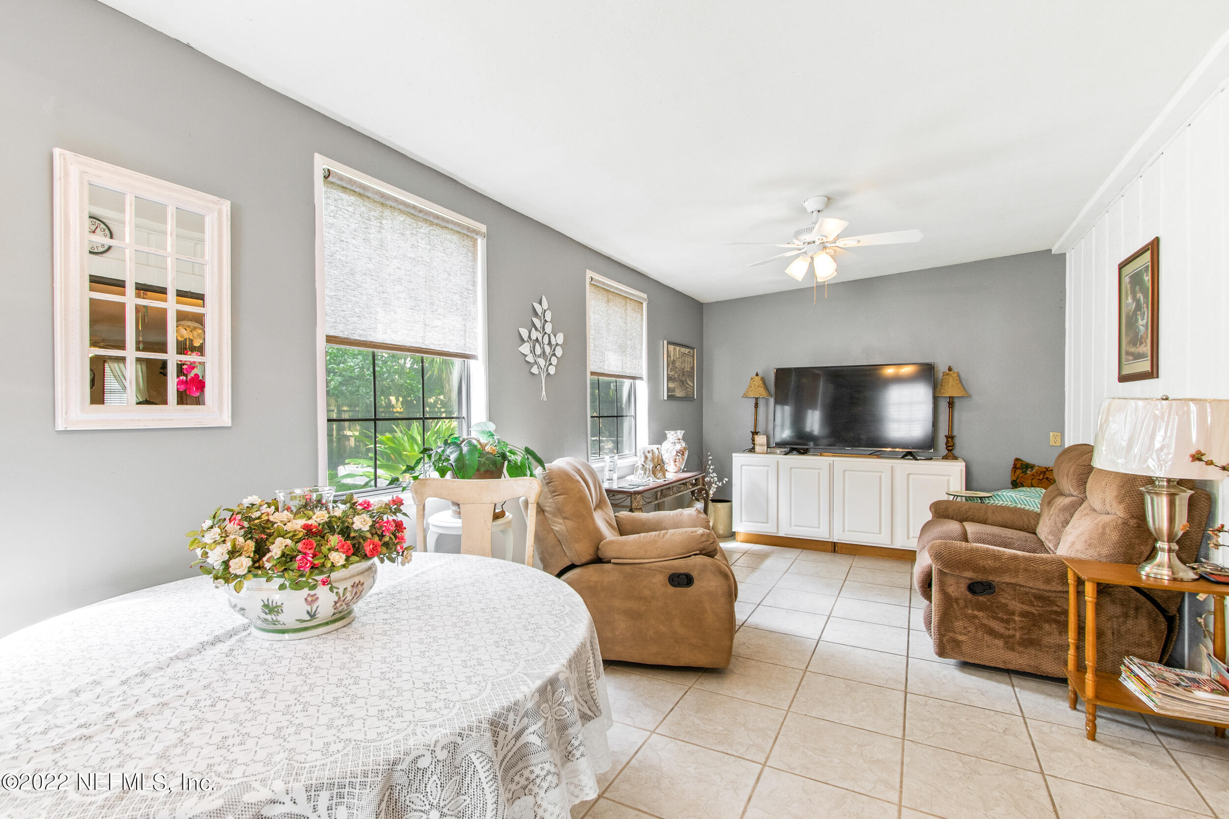 19 Madeore Street St. Augustine, FL 32084 - Photo 17 of 28 a living room with furniture and a flat screen tv