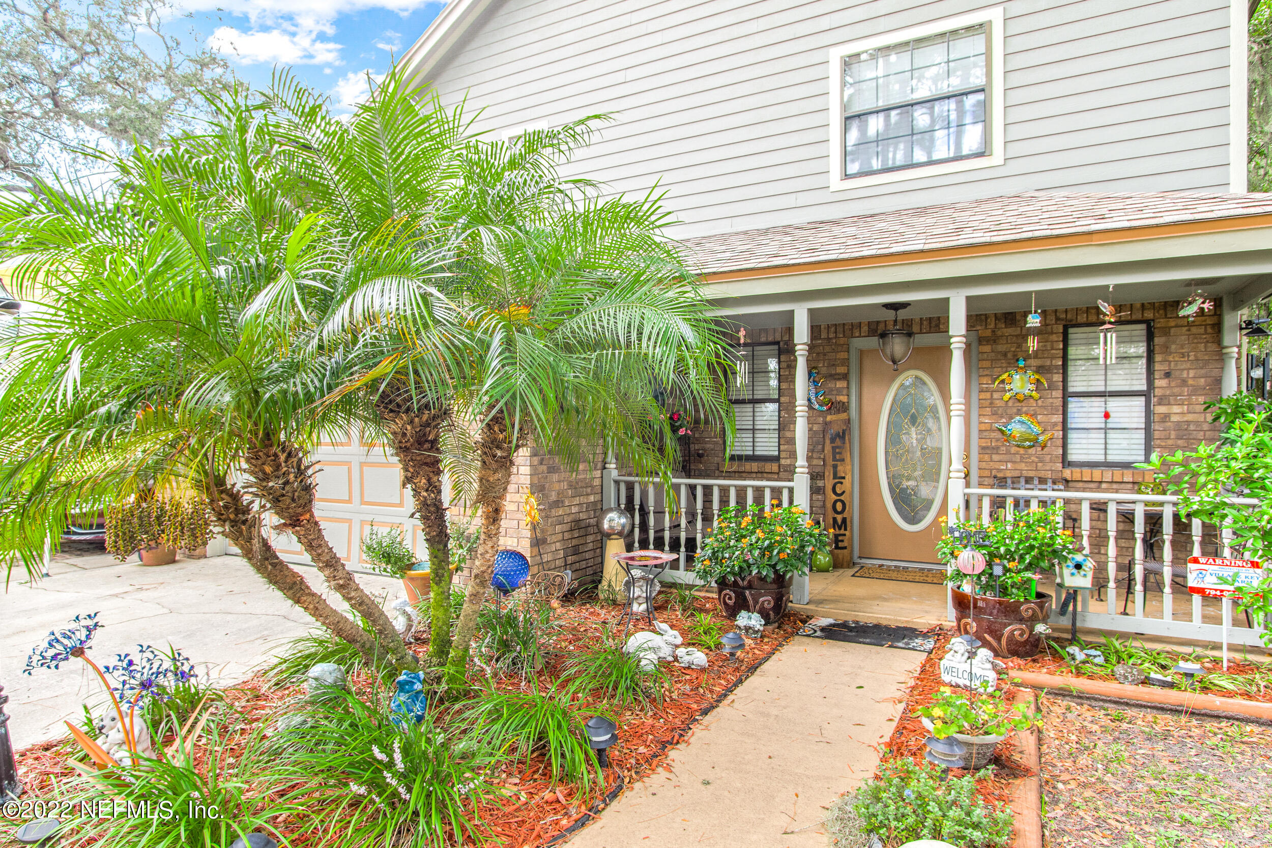 19 Madeore Street St. Augustine, FL 32084 - Photo 5 of 28 a front view of a house having patio