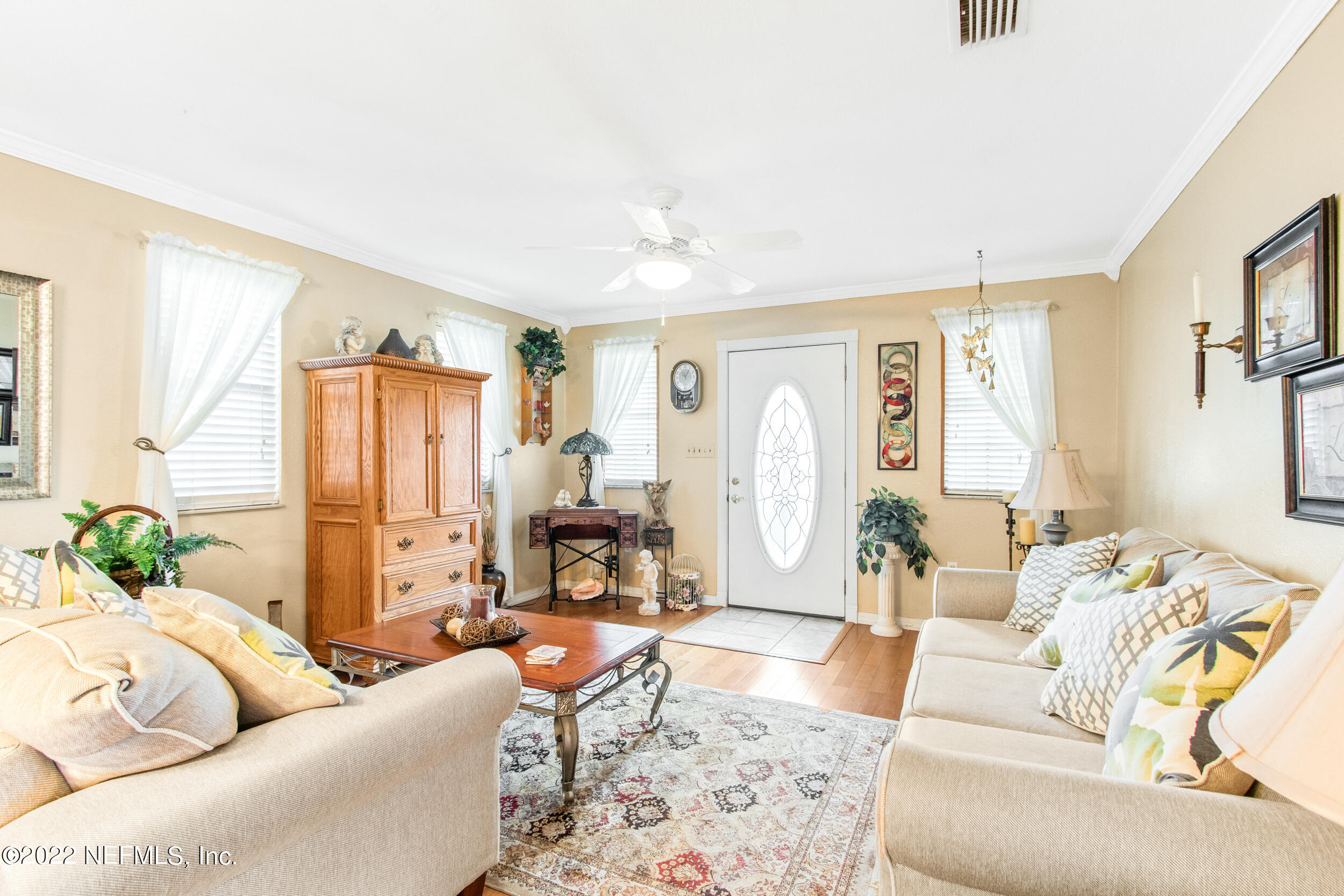 19 Madeore Street St. Augustine, FL 32084 - Photo 8 of 28 a living room with furniture and a large window