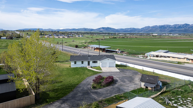 4155 Johnson Road Nibley, UT 84321 - Photo 61 of 71 View from above of property featuring a mountain backdrop