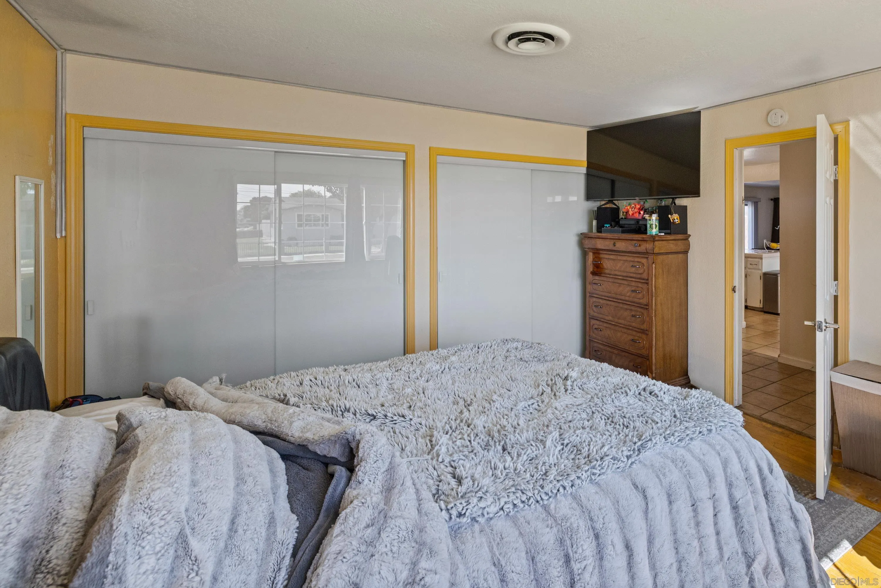284 Osage Drive Salinas, CA 93906 - Photo 13 of 24 a bedroom with a bed and a dresser