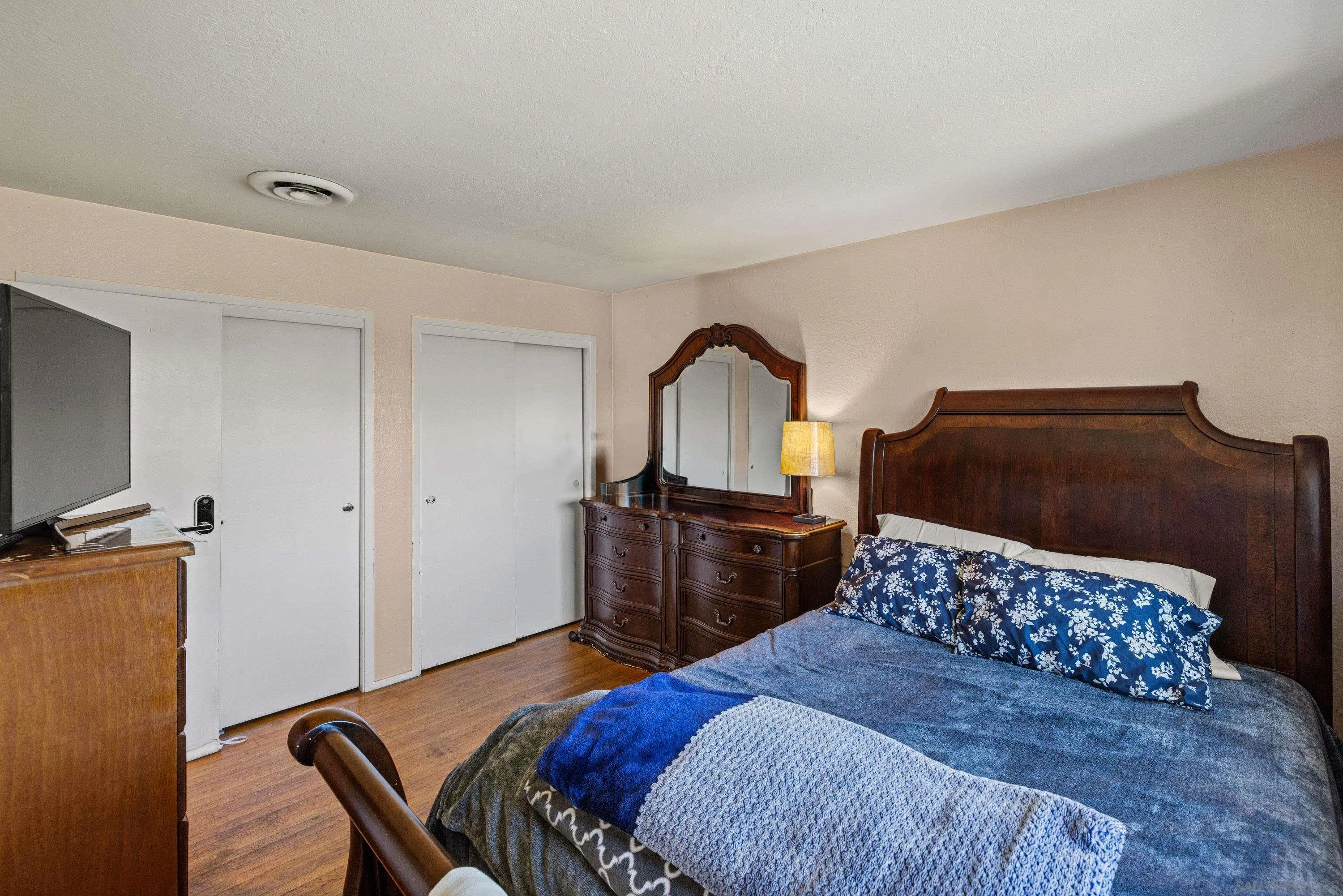 284 Osage Drive Salinas, CA 93906 - Photo 14 of 24 a bedroom with a bed and a dresser