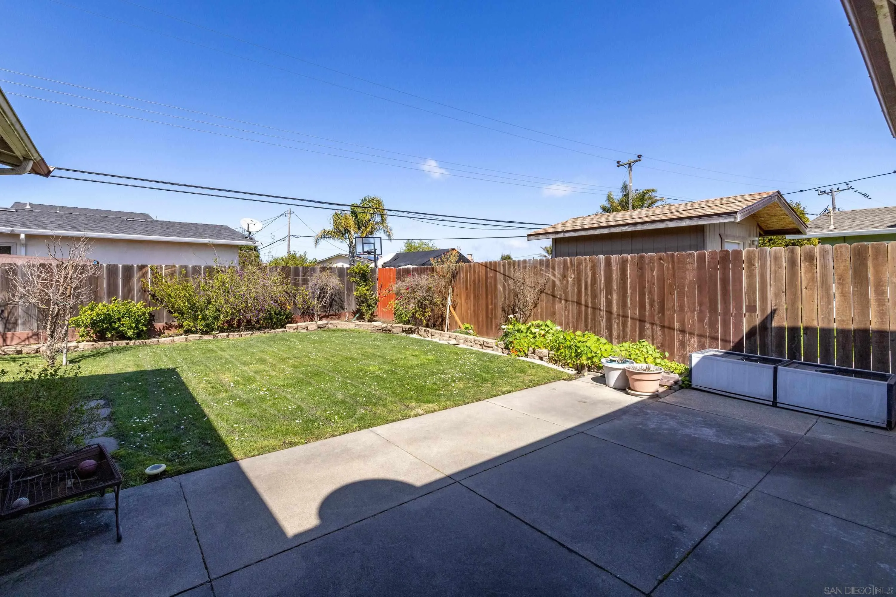 284 Osage Drive Salinas, CA 93906 - Photo 24 of 24 a view of a backyard with couches under an umbrella