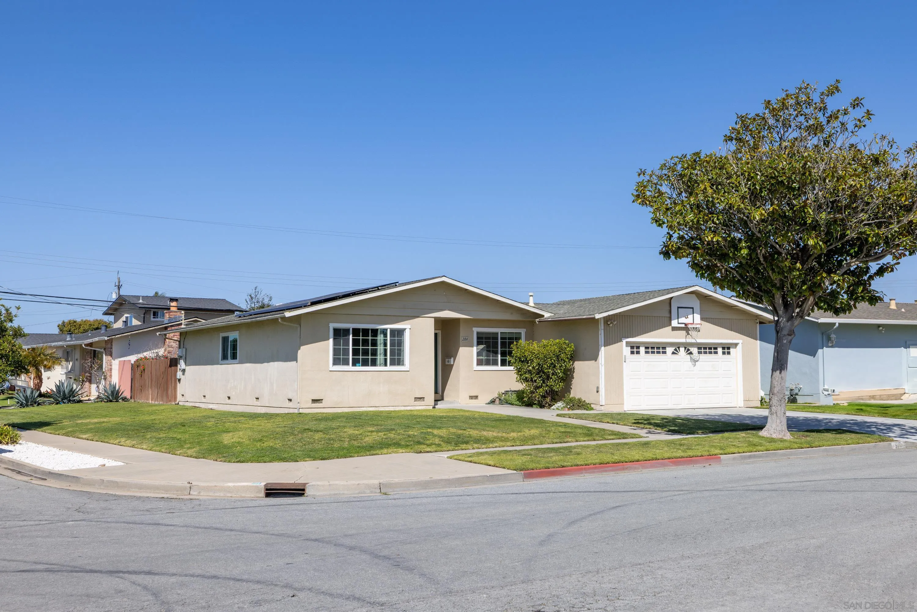 284 Osage Drive Salinas, CA 93906 - Photo 3 of 24 a front view of a house with a garden and yard