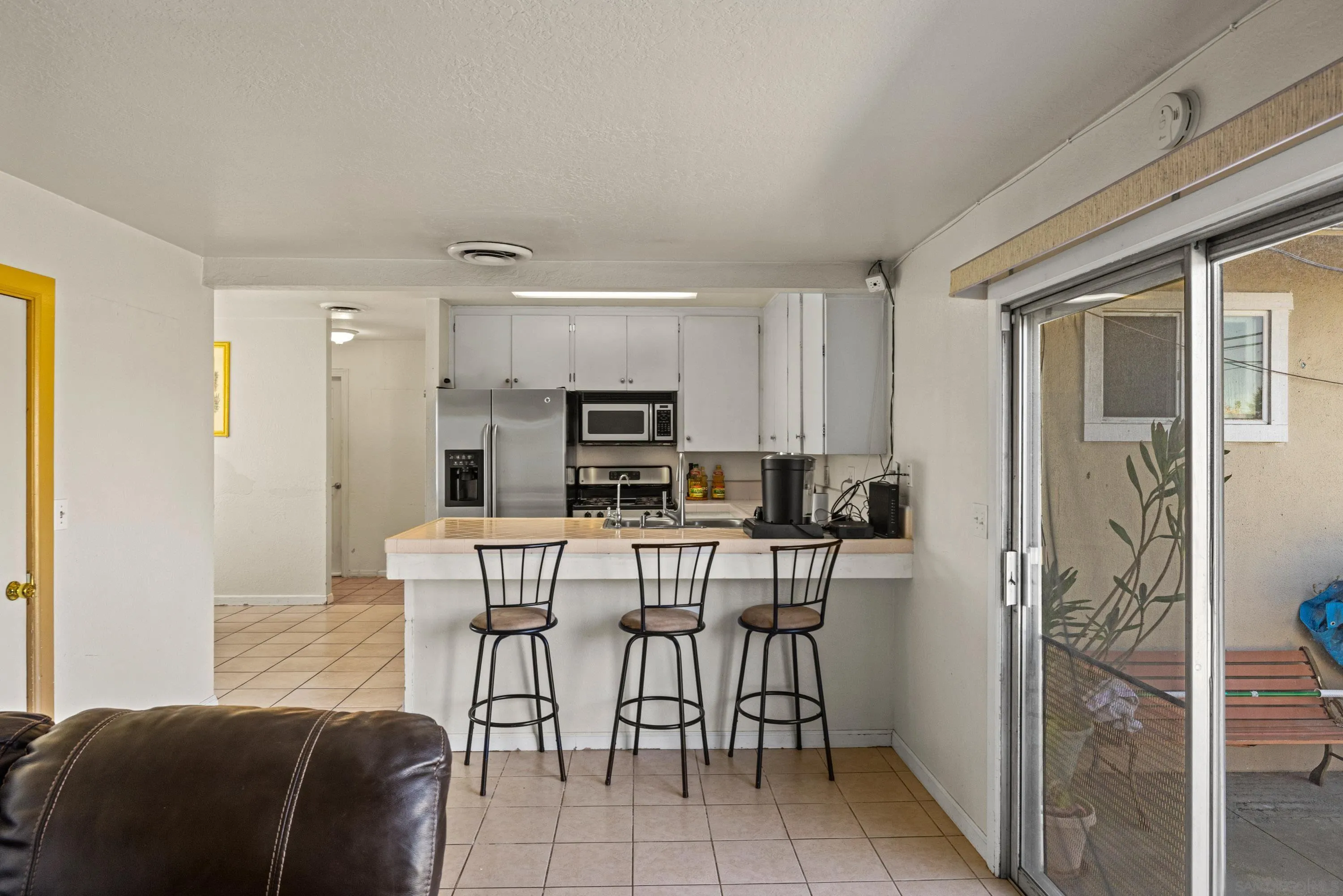 284 Osage Drive Salinas, CA 93906 - Photo 7 of 24 a view of a dining room with furniture and a kitchen