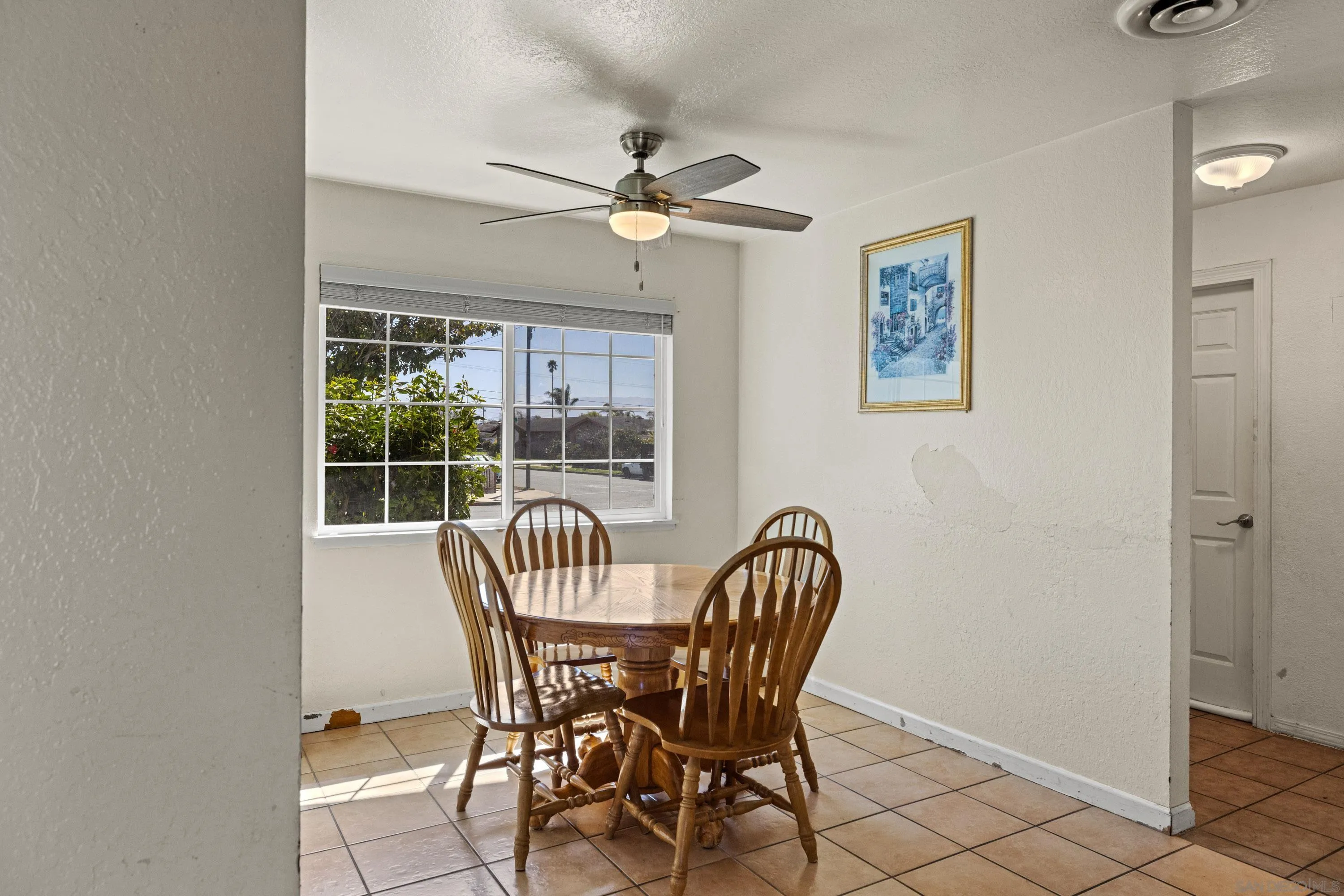 284 Osage Drive Salinas, CA 93906 - Photo 9 of 24 a view of a dining room that has a table and chairs
