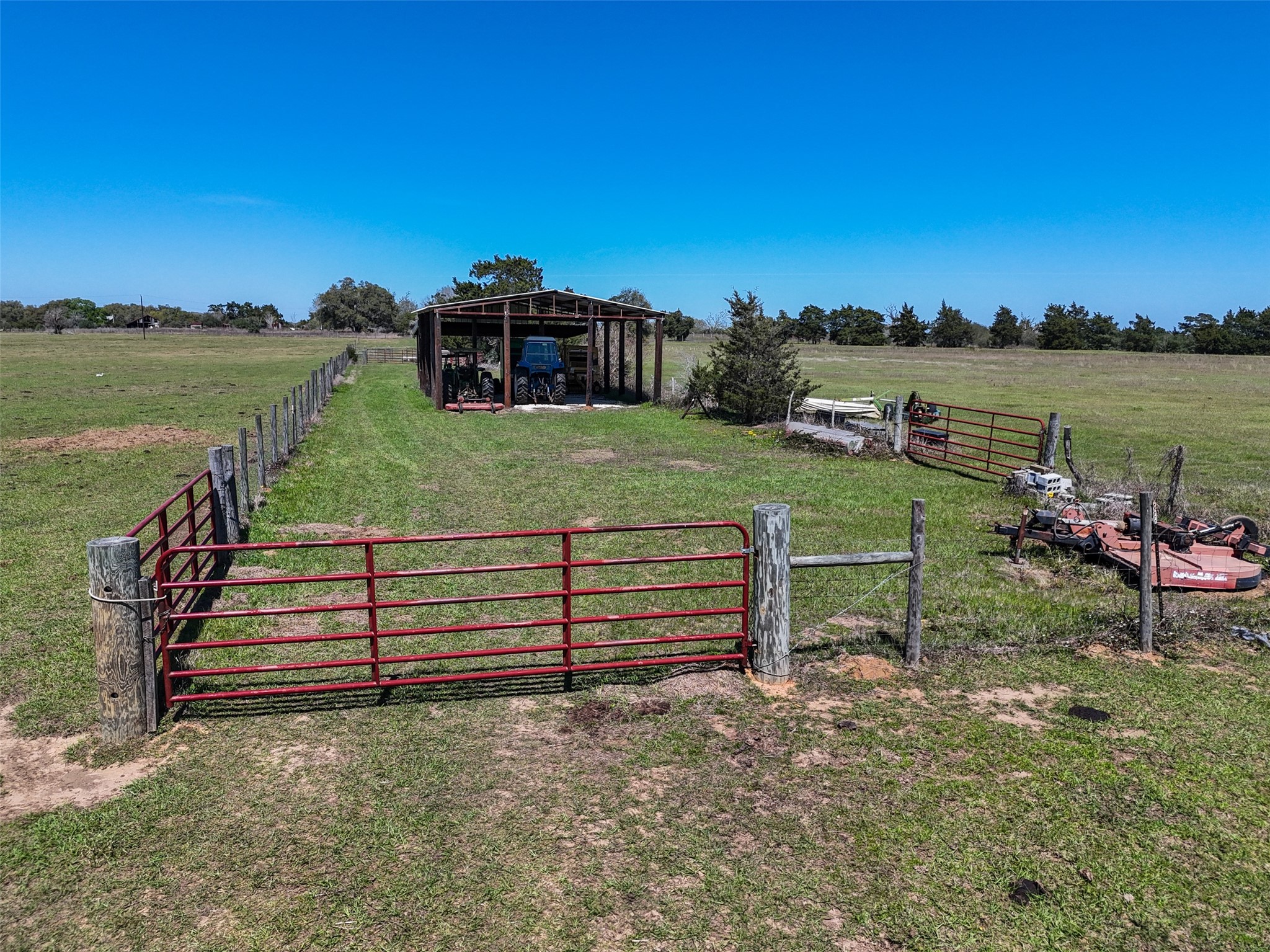 1 Reitz Quinn Road Cat Spring, TX 78933 - Photo 5 of 12 a view of a bench in front of a lake