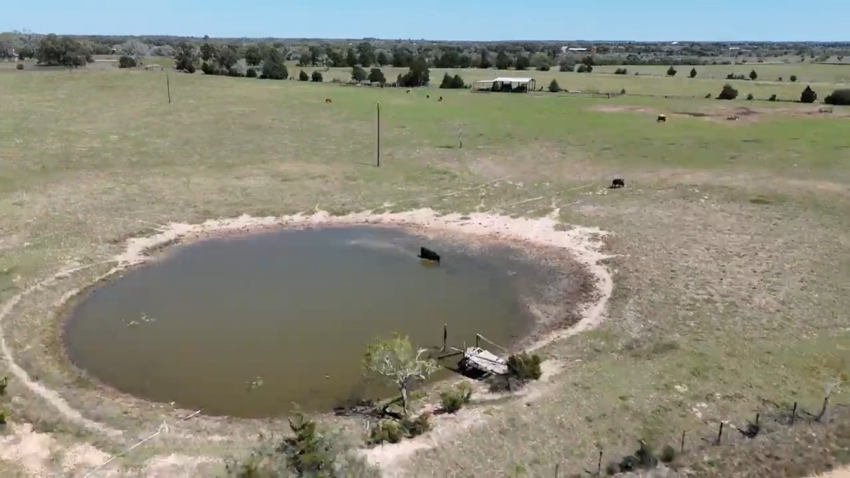 1 Reitz Quinn Road Cat Spring, TX 78933 - Photo 8 of 12 a view of a lake in a field