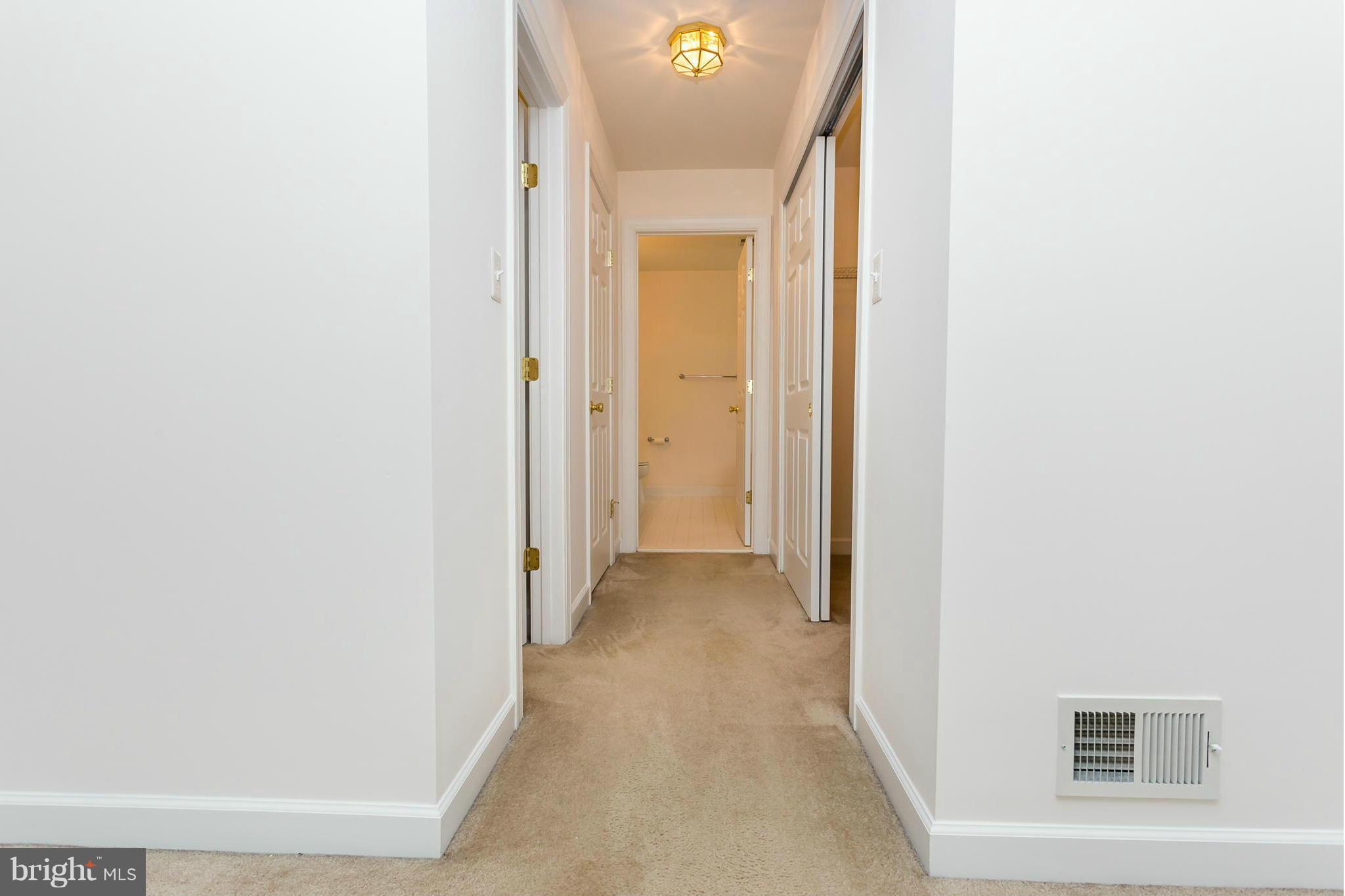 4141 Agency Loop Triangle, VA 22172 - Photo 22 of 30 a view of a hallway with closet