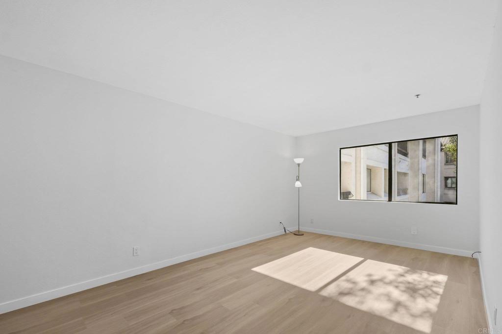 5745 Friars Road, Unit 116 San Diego, CA 92110 - Photo 19 of 44 an empty room with a window
