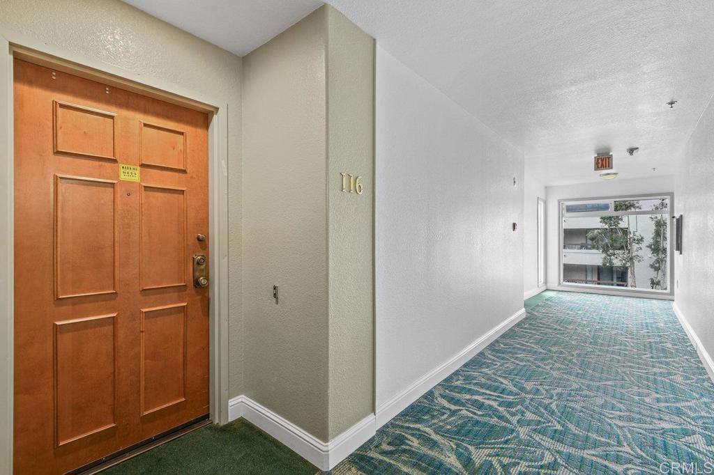 5745 Friars Road, Unit 116 San Diego, CA 92110 - Photo 26 of 44 an empty room with closet