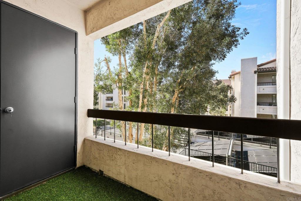 5745 Friars Road, Unit 116 San Diego, CA 92110 - Photo 27 of 44 swimming pool view from a balcony