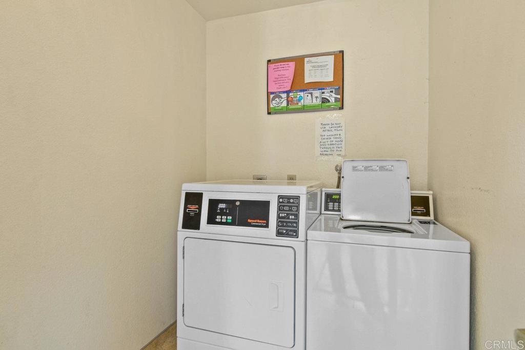 5745 Friars Road, Unit 116 San Diego, CA 92110 - Photo 30 of 44 a utility room with dryer and washer